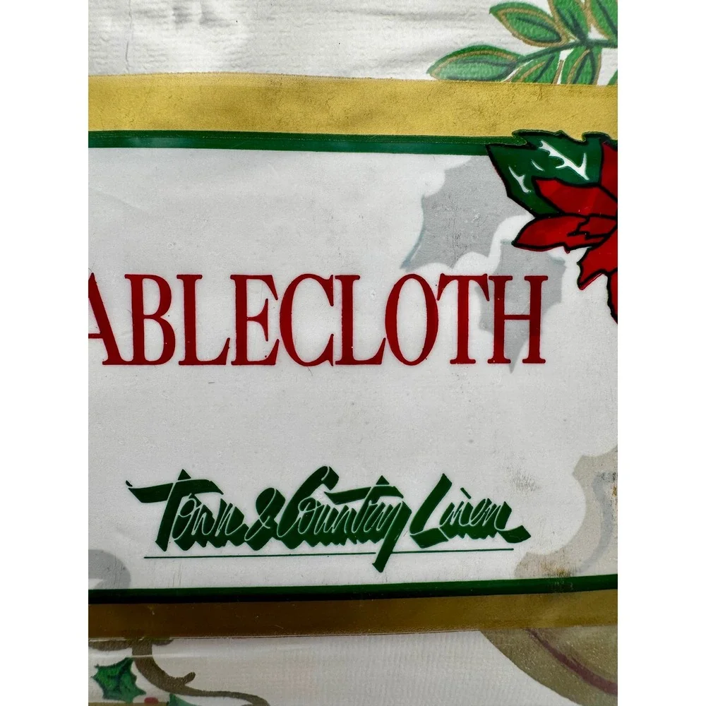 VTG Town & Country Christmas Vinyl Tablecloth 52x90 Oblong Horn Holly Bow NOS